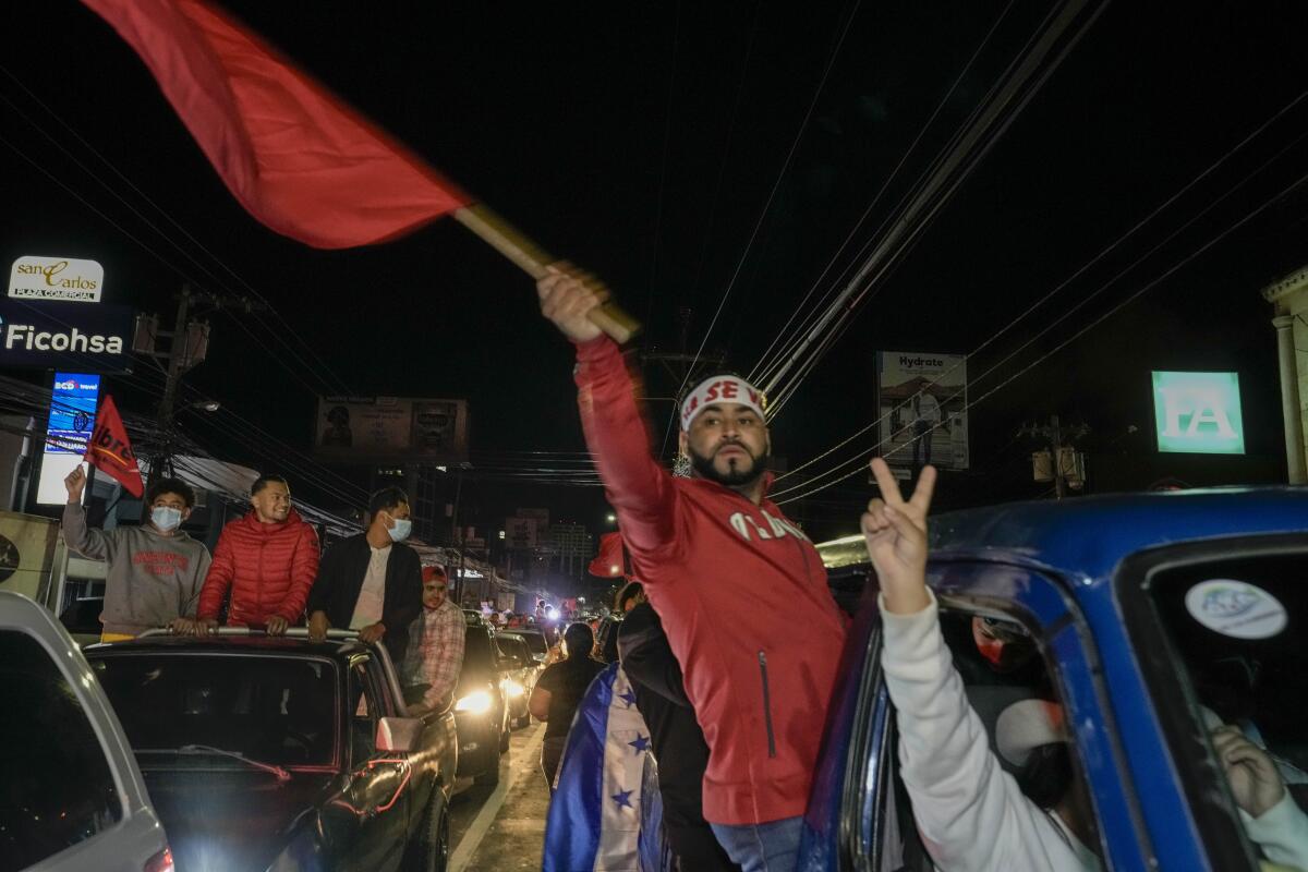 Free Party presidential candidate Xiomara Castro supporters celebrate after general elections, in Tegucigalpa, Honduras