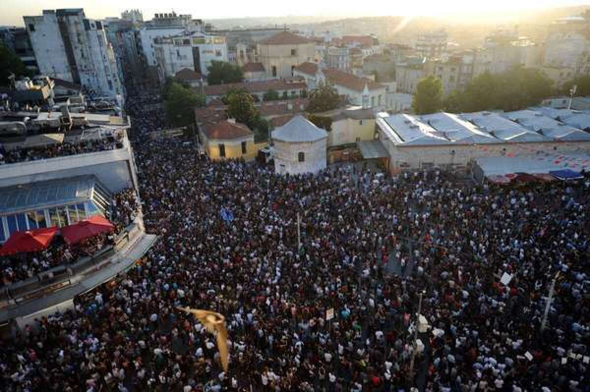 Protesters gather on Taksim Square during a demonstration against the government in Istanbul on Tuesday.