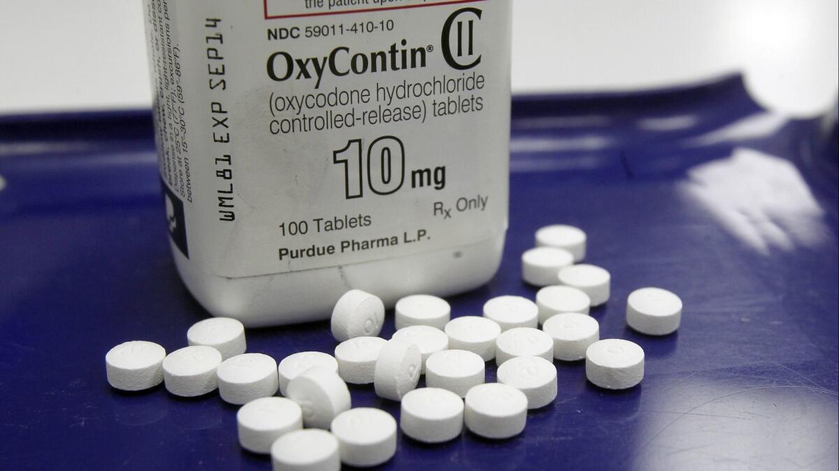 In this 2013 file photo, OxyContin pills are shown at a pharmacy in Vermont. On Thursday, San Diego's city attorney filed a federal lawsuit against the drugmakers and distributors of such powerful painkillers, saying the companies fueled the nation's opioid crisis.
