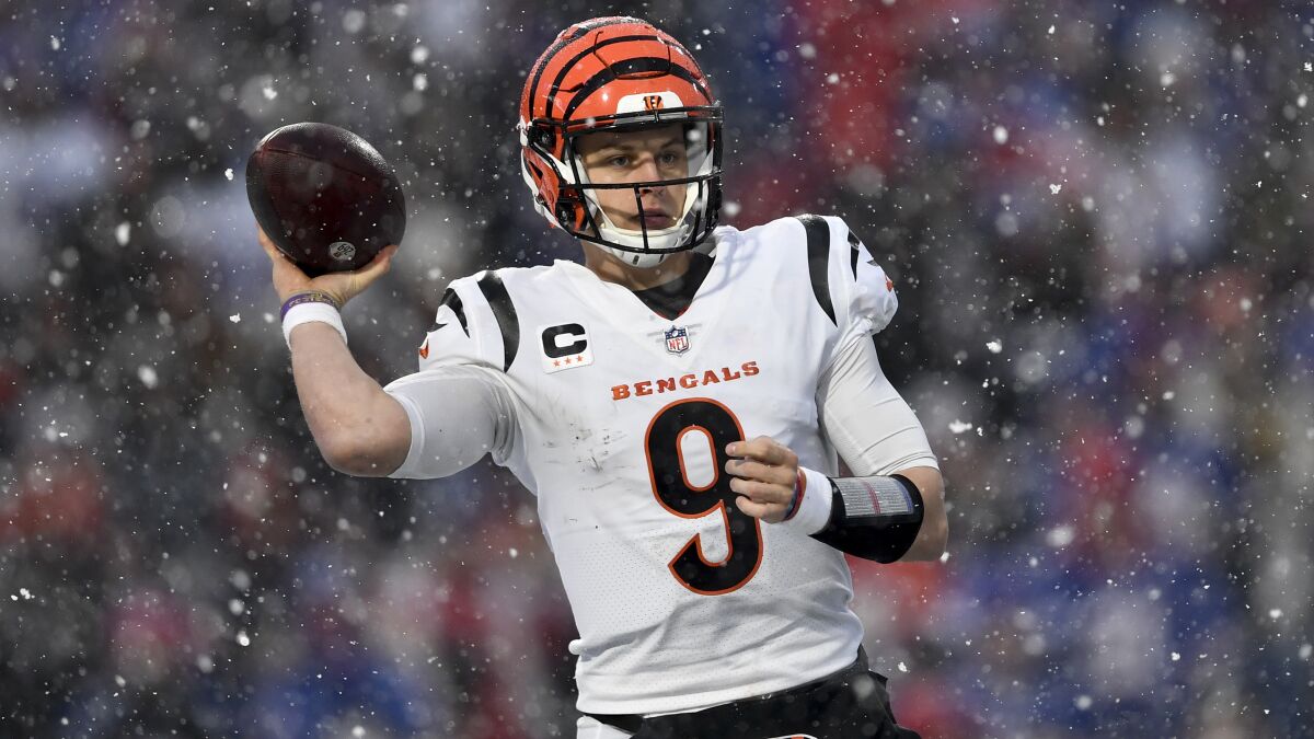 Bengals quarterback Joe Burrow attempts a pass in the snow at Buffalo last week.