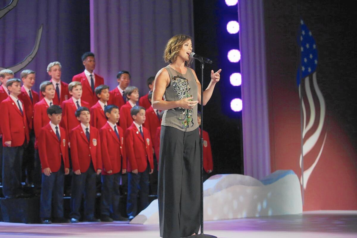 All American Boys Chorus from Costa Mesa will perform with Sarah McLachlan (pictured), Kristen Chenoweth and Kristen Bell during the ABC-TV special "It's Your 50th Christmas Charlie Brown,"airing Monday.