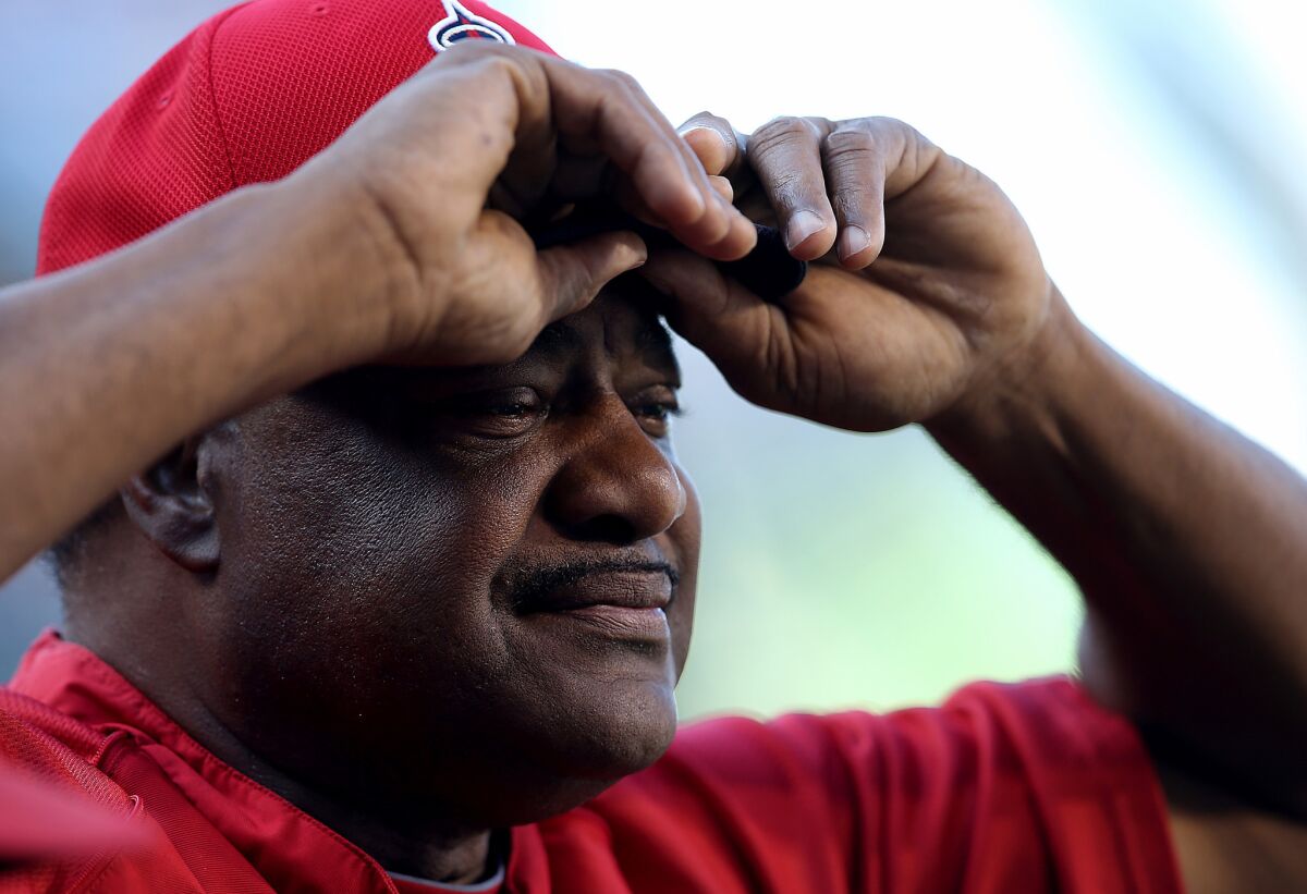 Angels hitting coach Don Baylor adjusts his cap before a game against the Twins on June 25, 2014.