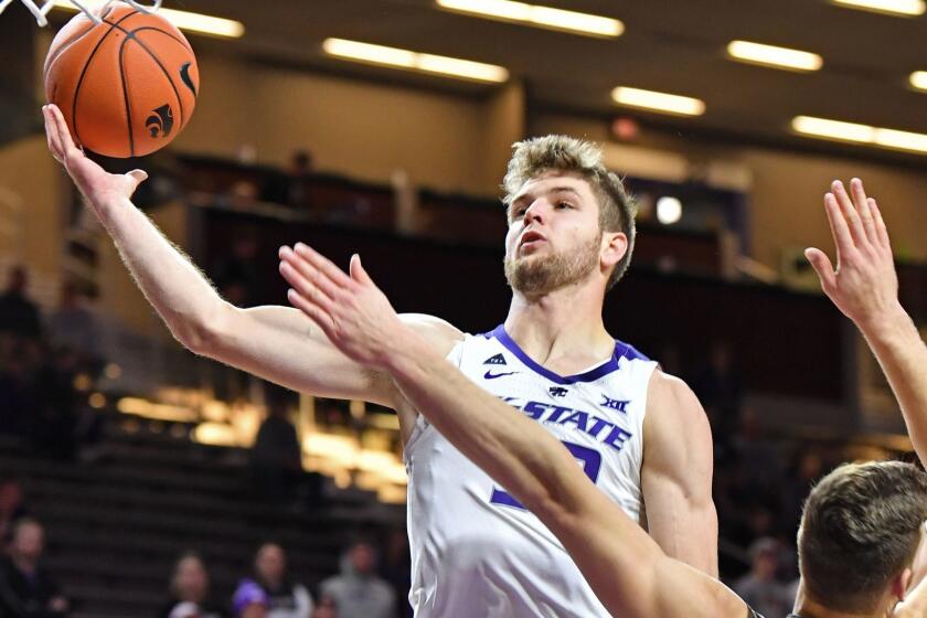 MANHATTAN, KS - NOVEMBER 24: Dean Wade #32 of the Kansas State Wildcats drives in for a basket against the Lehigh Mountain Hawks during the second half on November 24, 2018 at Bramlage Coliseum in Manhattan, Kansas. (Photo by Peter Aiken/Getty Images) ** OUTS - ELSENT, FPG, CM - OUTS * NM, PH, VA if sourced by CT, LA or MoD **