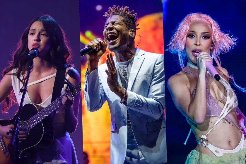 2021 AMERICAN MUSIC AWARDS - The AMAs will air live from the Microsoft Theater in Los Angeles on Sunday, Nov. 21, at 8:00 p.m. EST/PST on ABC. (ABC via Getty Images) AUSTIN, TEXAS - OCTOBER 10: Jon Batiste performs at ACL Music Festival at Zilker Park on October 10, 2021 in Austin, Texas. (Photo by Josh Brasted/FilmMagic) Las Vegas, CA - November 13: Doja Cat performs on the Frank Stage on the second day of the three-day Day N Vegas hip-hop music festival at the Las Vegas Festival Grounds in Las Vegas on Saturday, Nov. 13, 2021. (Allen J. Schaben / Los Angeles Times)