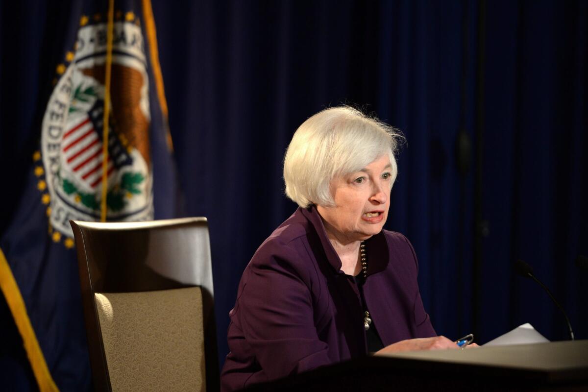 Federal Reserve Chairwoman Janet Yellen says the Fed didn't raise interest rates because of continuing concerns about the economy.