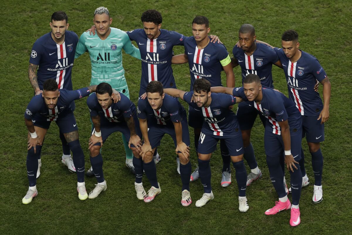 Team PSG pose prior to the Champions League final soccer match between Paris Saint-Germain and Bayern Munich at the Luz stadium in Lisbon, Portugal, Sunday, Aug. 23, 2020. (AP Photo/Manu Fernandez, Pool)