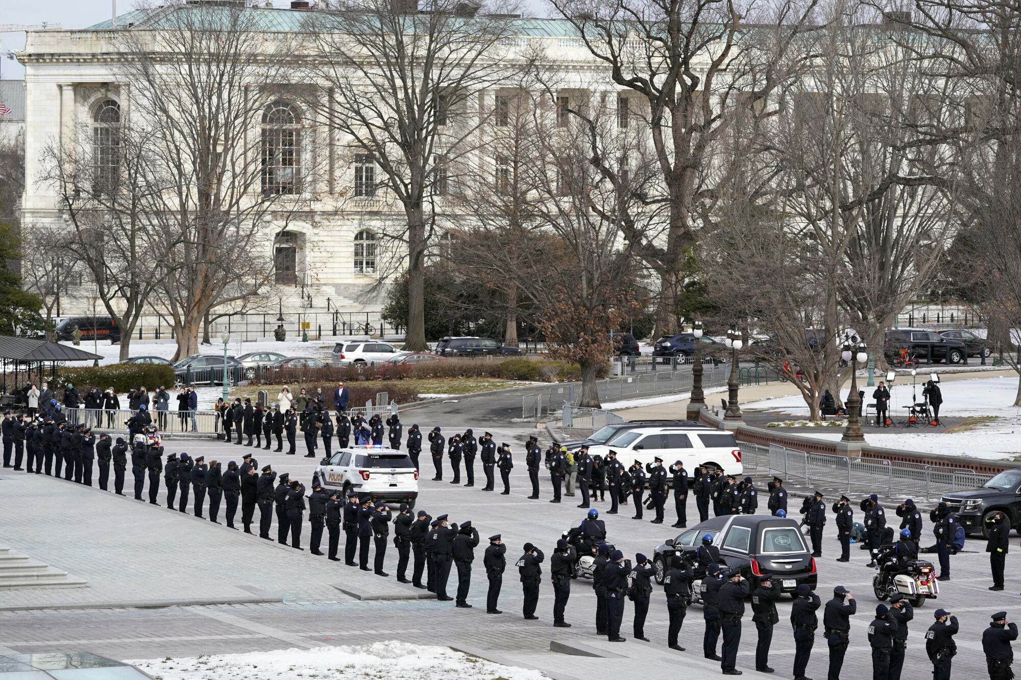 A hearse leaves the Capitol with the  Sicknick remains.