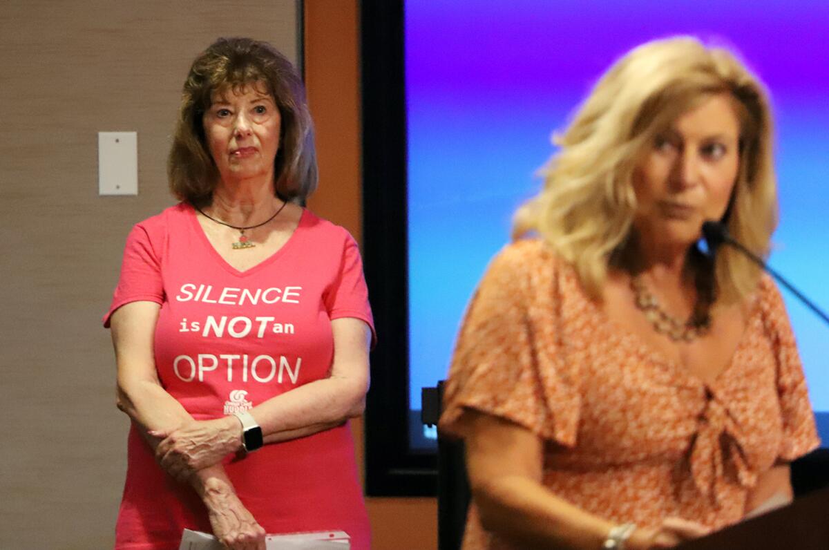 Diane Bentley, left, listens to Paula Jean discuss a potential ordinance.