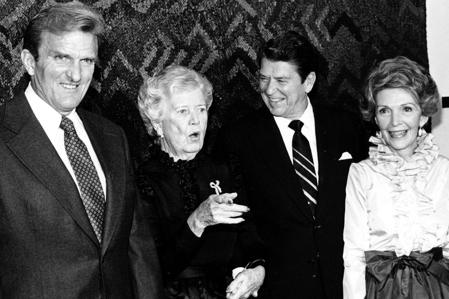 The Reagans attend a 1980 reception in their honor in Los Angeles with Los Angeles Times Publisher Otis Chandler and his mother, Dorothy.