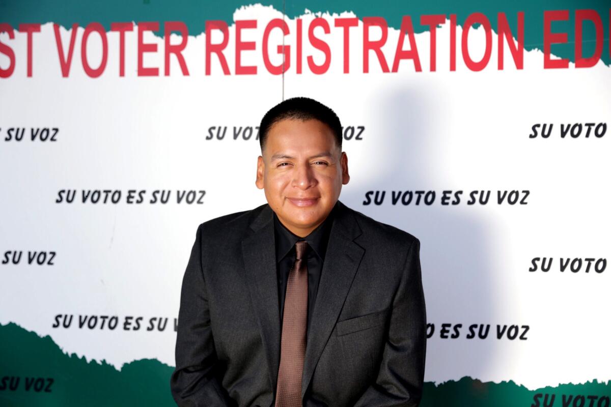 Ivan Rojas, a 35-year-old security guard, is the winner of $25,000 voter participation drawing, sponsored by the Southwest Voter Registration Education Project in Los Angeles.