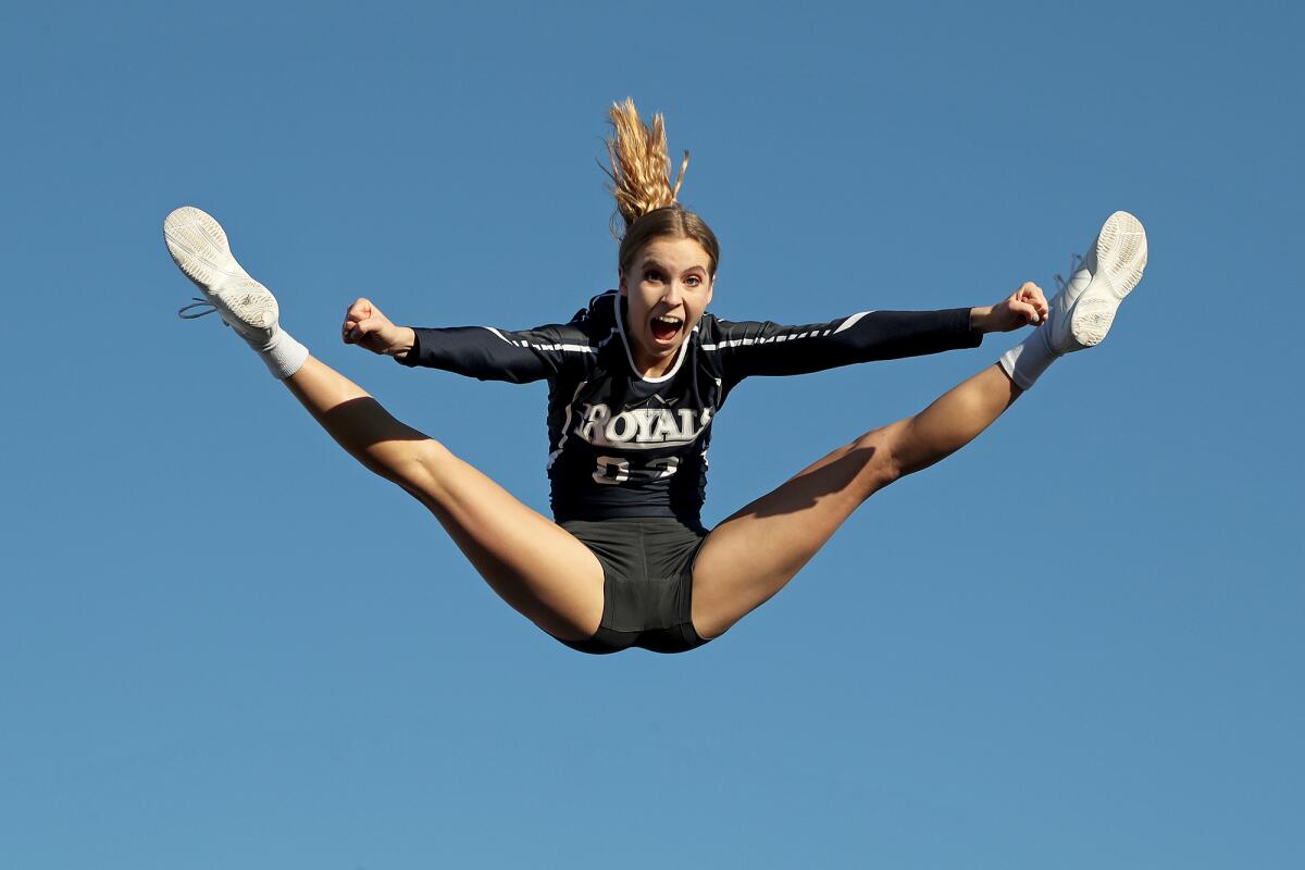 Kamea Binnquist performs a jump split.