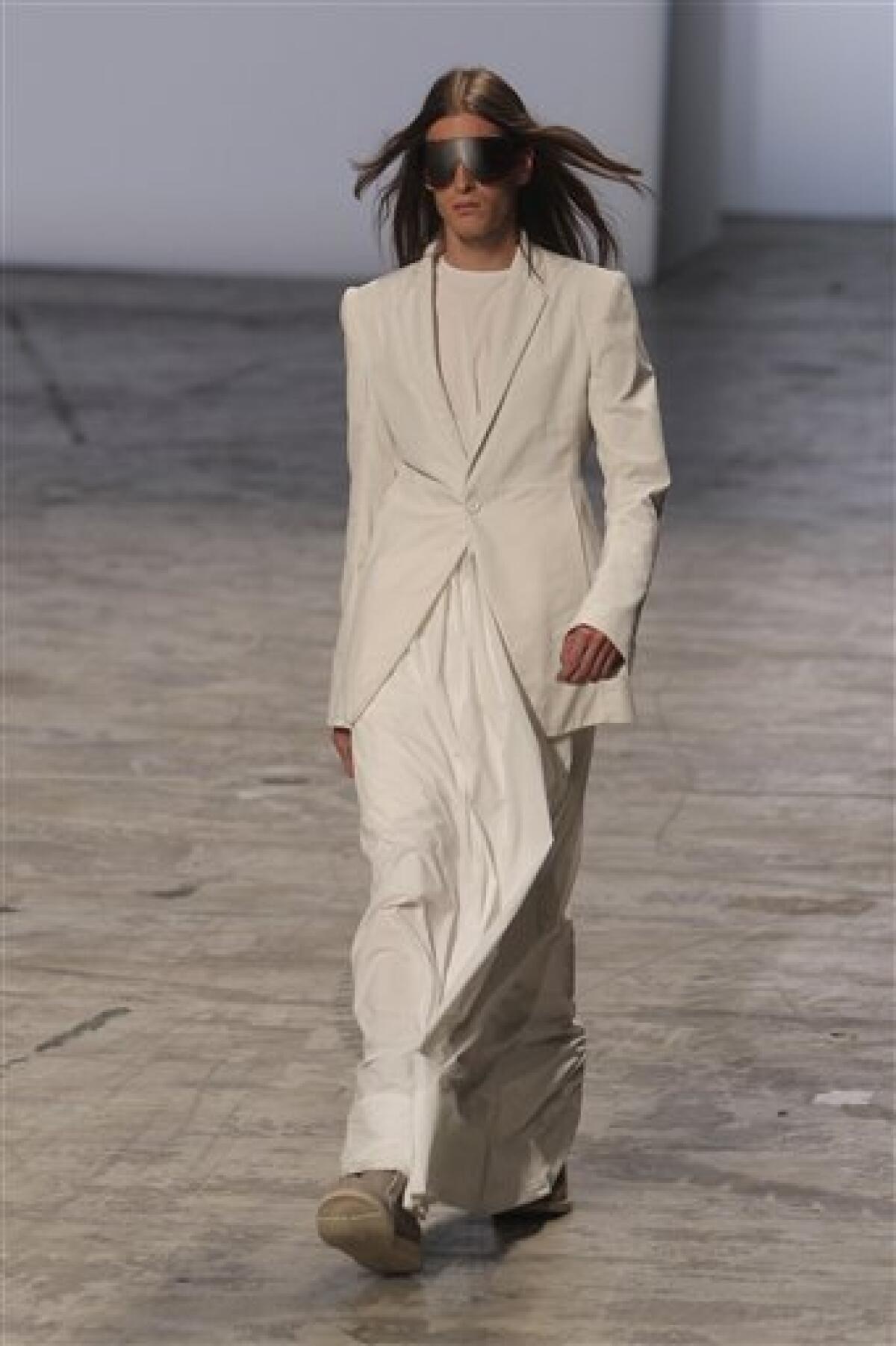 A model wears a creation by Kim Jones as part of Louis Vuitton Men's  fashion Spring Summer 2012 collection presented during the Paris Men's  Fashion Week, in Paris, France, June 23, 2011.