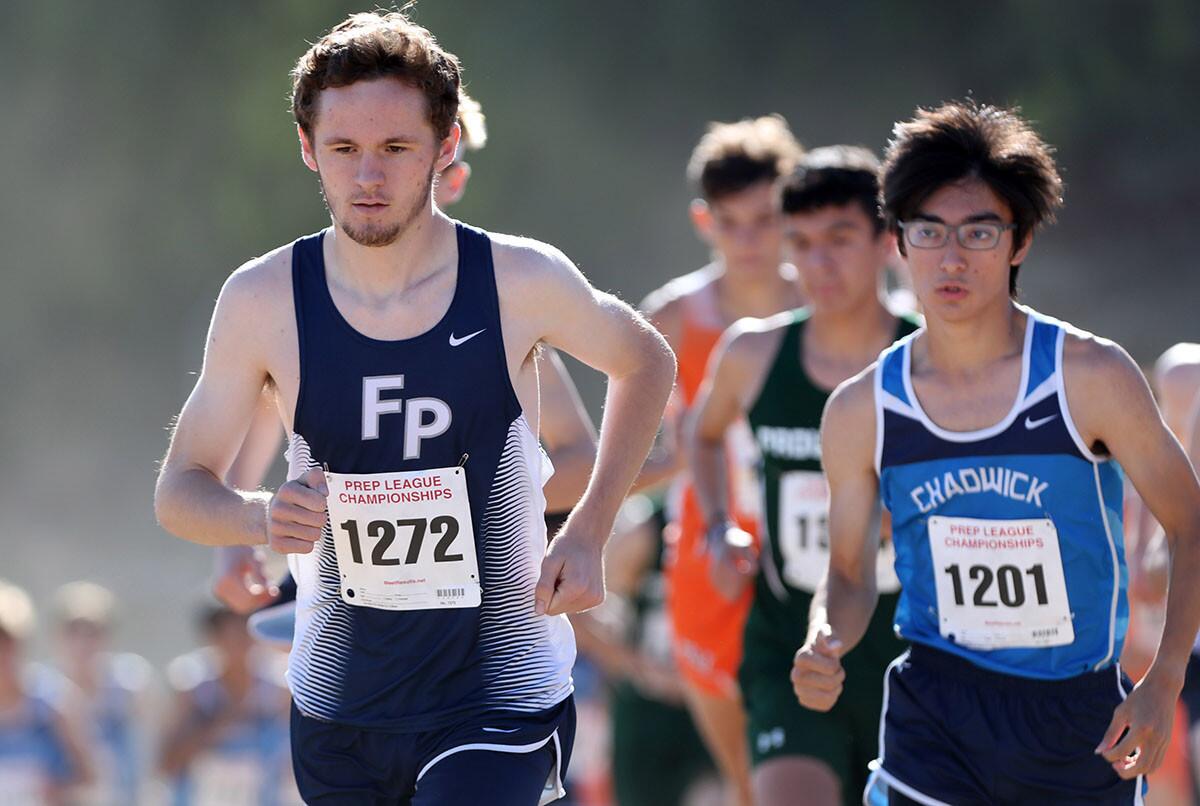Flintridge Prep cross country runner Carson Hasbrouck led most of the way and won the Prep League Cross Country boys varsity finals at Pierce College in Woodland Hills on Saturday, Oct. 27, 2018.