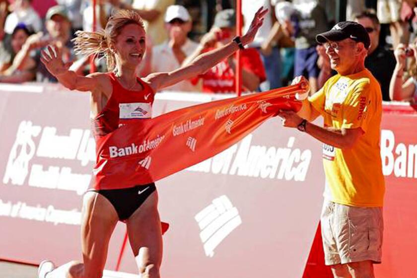 Liliya Shobukhova became the first woman to win the Chicago Marathon three times when she crossed the finish line in 2011.