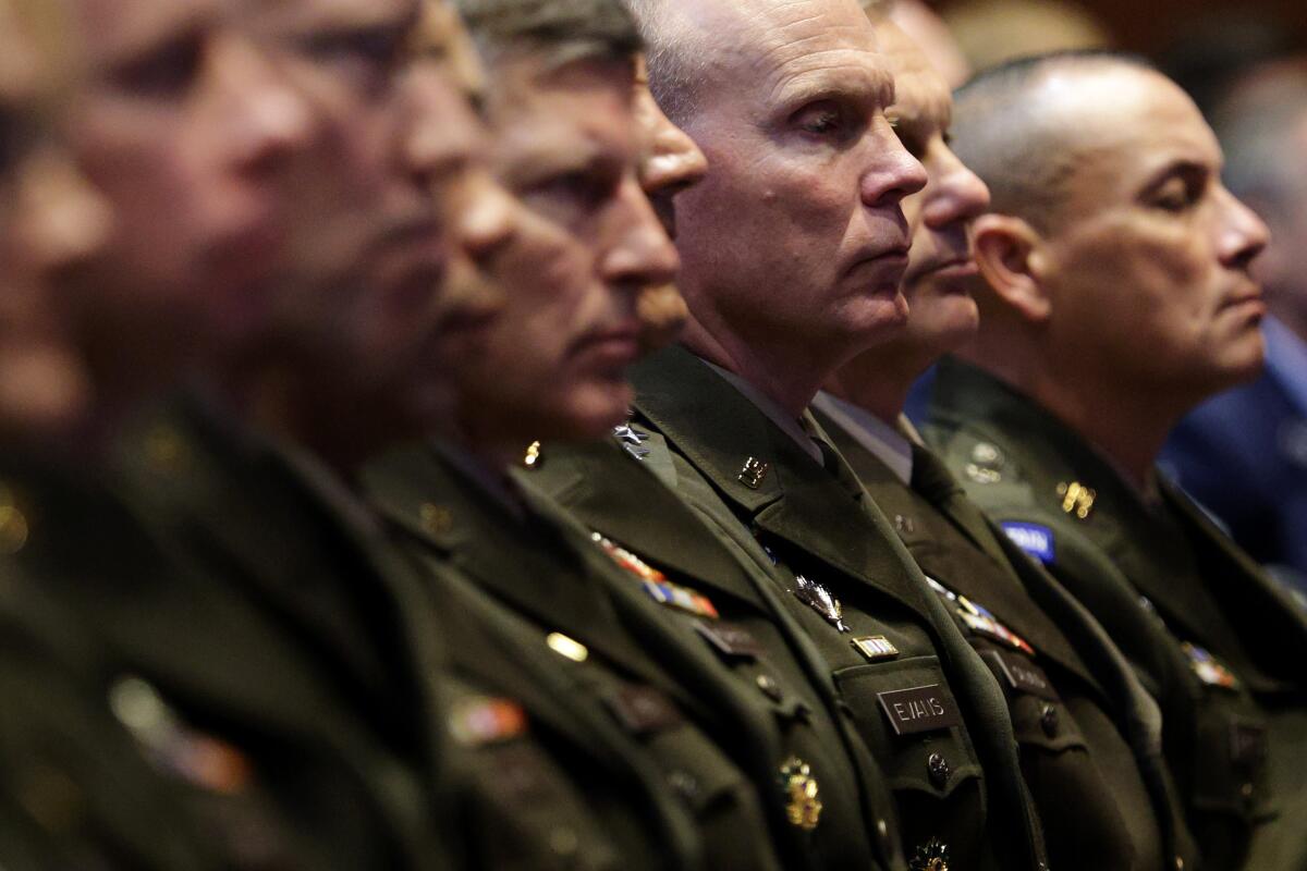 People in military uniforms.