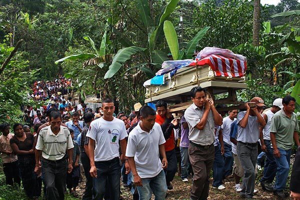 Mourners carry casket of Manuel Jaminez Xum in Guatemala in 2010