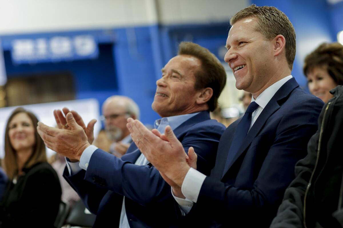 Assemblyman Chad Mayes (R-Yucca Valley), right, with former Gov. Schwarzenegger, at an event to debut their group New Way California.