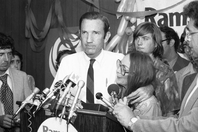 FILE - In this Wednesday, Sept. 14, 1976 file photo, Ramsey Clark, Democratic candidate for the U.S. Senate, center, speaks at Lincoln Center in New York. Ramsey Clark, the attorney general in the Johnson administration who became an outspoken activist for unpopular causes and a harsh critic of U.S. policy, has died, Friday, April 9, 2021. He was 93. (AP Photo/Dave Pickoff, File)