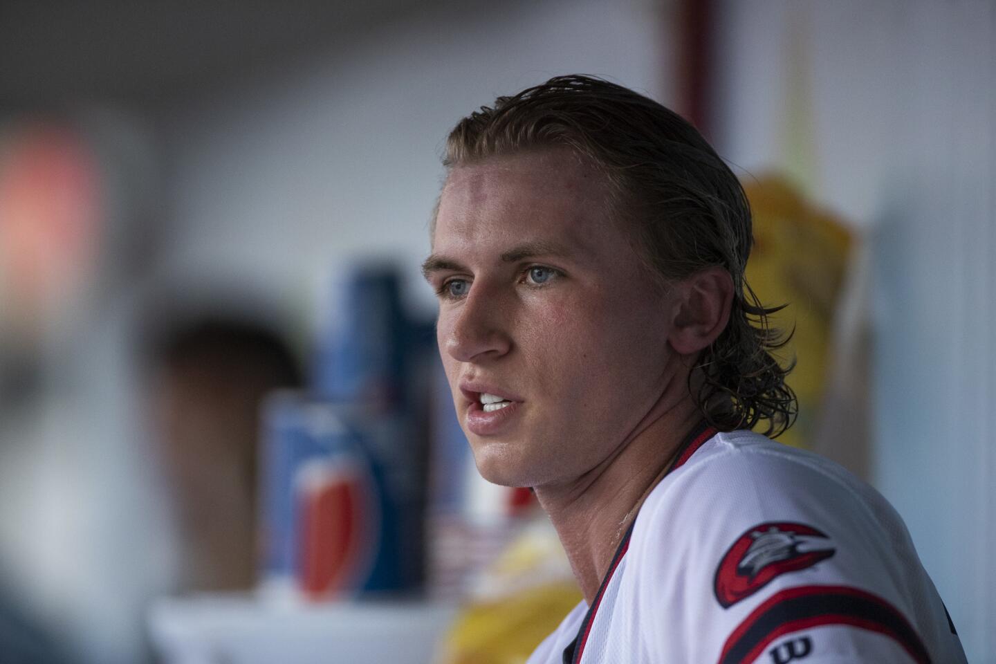 Michael Kopech catches his breath in the dugout after the first inning during a Charlotte Knights baseball game against Norfolk on Wednesday, March 23, 2018, in Charlotte, NC.