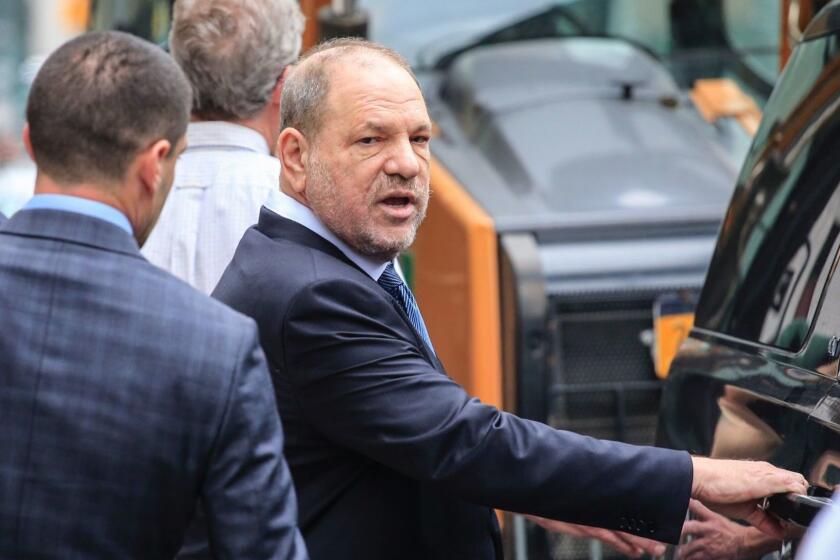 Harvey Weinstein (R) leaves at Manhattan Criminal Court on October 11, 2018 in New York City. - A New York judge on Thursday dismissed one charge against Harvey Weinstein, but left the disgraced Hollywood titan facing five other charges in connection with alleged sexual assault. (Photo by KENA BETANCUR / AFP)KENA BETANCUR/AFP/Getty Images ** OUTS - ELSENT, FPG, CM - OUTS * NM, PH, VA if sourced by CT, LA or MoD **