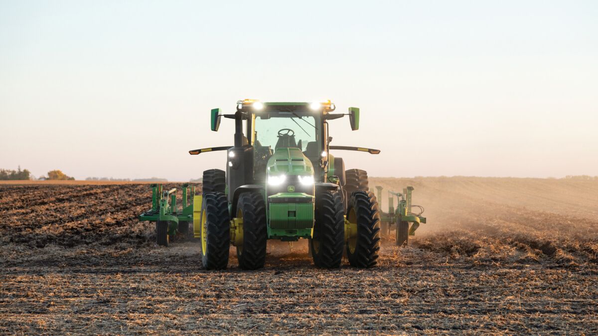 This 2021 photo provided by John Deere shows an autonomous tractor plowing a field, without a driver, on a farm in Blue Earth, Minn. (Bill Krzyzanowski/John Deere via AP)