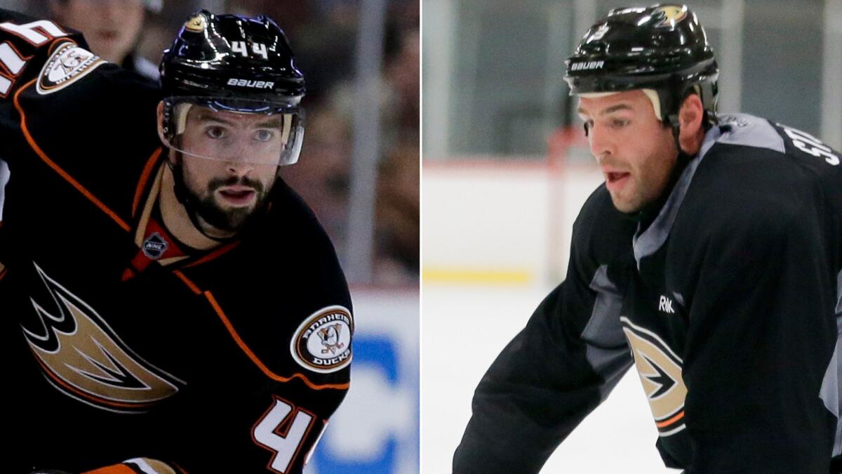 Ducks defensemen Nate Thompson, left, and Clayton Stoner are hoping to make a big impact on the blueline this season.