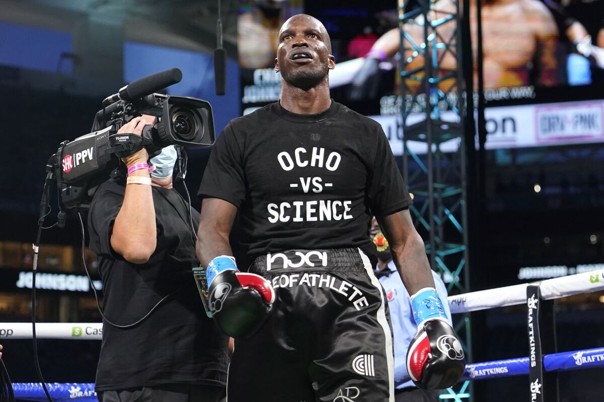 Former NFL wide receiver Chad Johnson walks into the ring Sunday