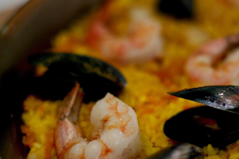 Paella's always a perfect choice when you want to dazzle dinner guests but don't want to spend all your time in the kitchen. Recipe: Paella de mariscos
