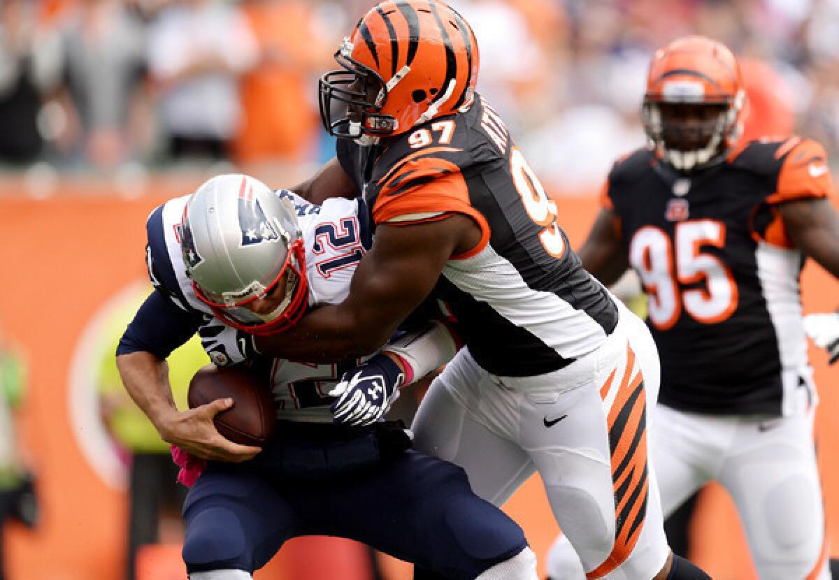Bengals defensive tackle Geno Atkins sacks Patriots quarterback Tom Brady during a game last month in Cincinnati.