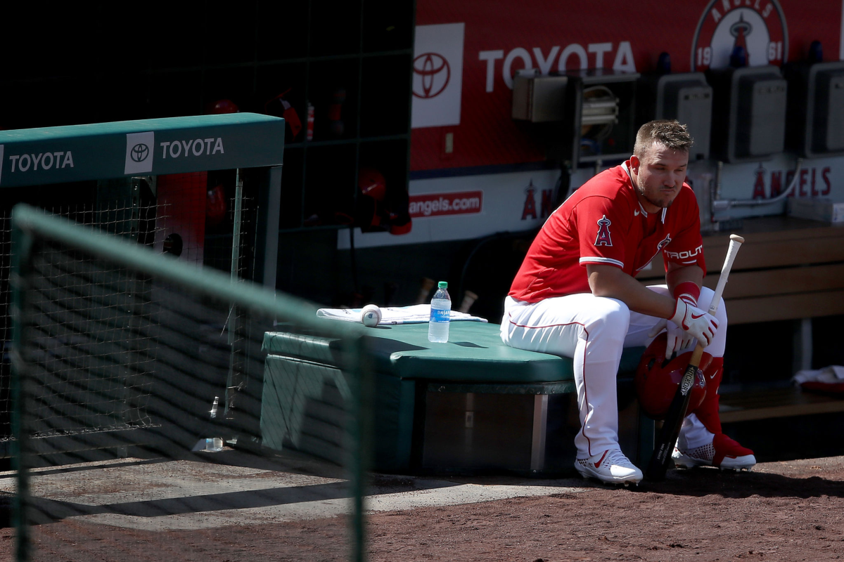 Angels center fielder Mike Trout looks on from the dugout during an intrasquad game.