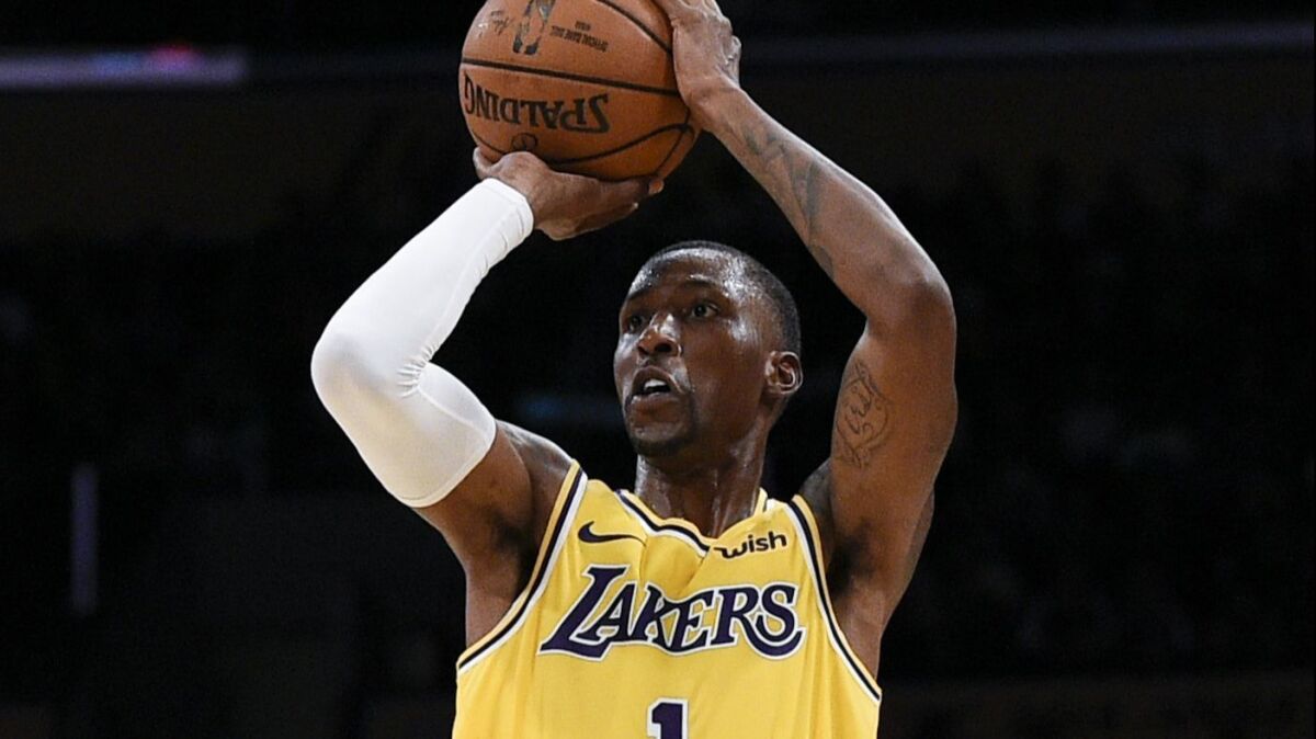 Lakers guard Kentavious Caldwell-Pope attempts a shot during the first half of a preseason game against the Sacramento Kings on Thursday.