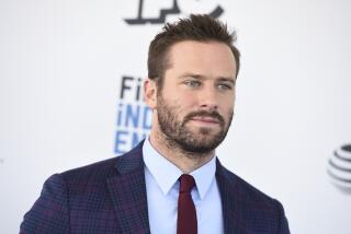 Actor Armie Hammer in a suit