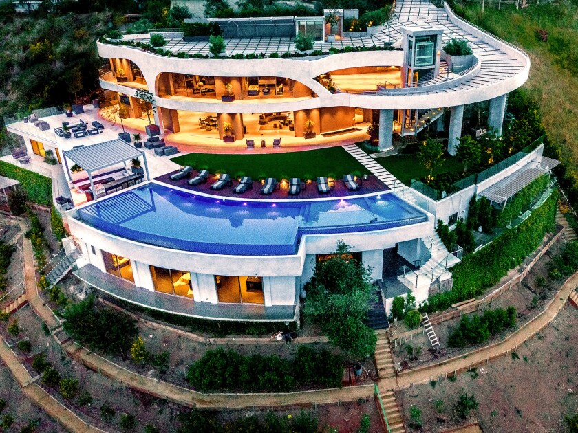 This curving Home of the Week in Brentwood is listed at $42 million.