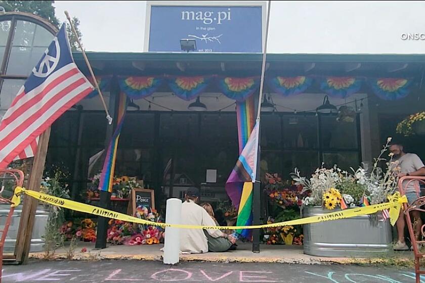 People gathered and brought flowers, flags and banners at the Mag.pi store on Aug. 18, 2023 in Cedar Glen. (ONSCENE.TV)