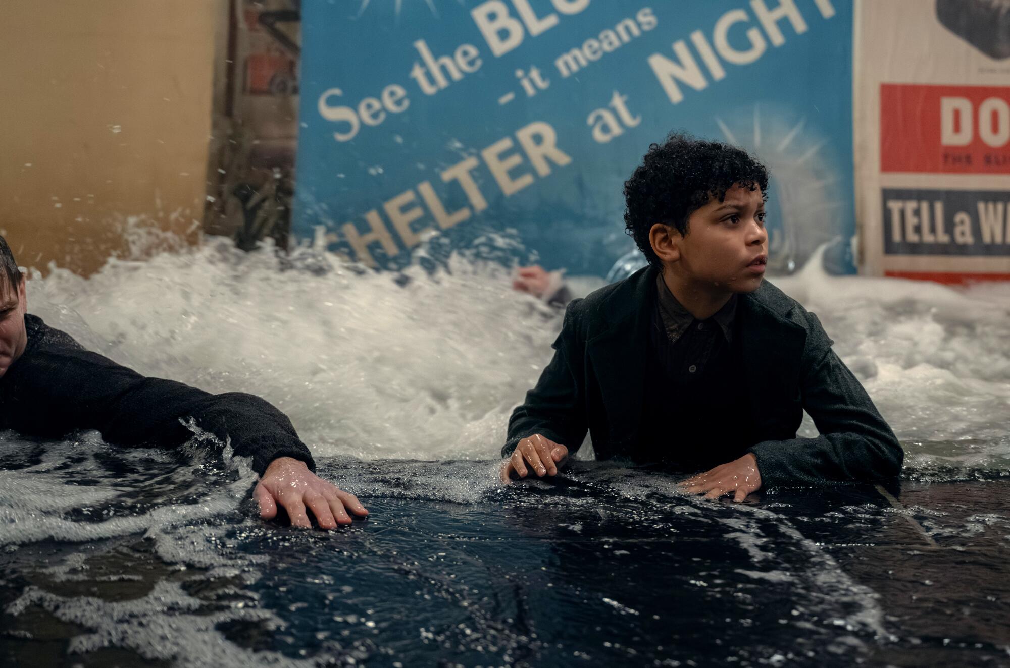 Elliott Heffernan struggles in a flooding subway station in "Blitz,"