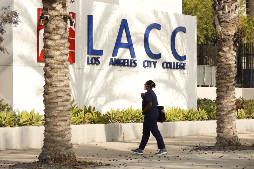 LOS ANGELES, CA - AUGUST 30: A portion of the enrolled student body returns to in-class instruction for the reopening on Monday August 30th of Los Angeles City College (LACC) in the LACCD, the nation's largest community college district. School will look a bit different this year, as masks will be required on-campus. A majority of students at LACC are continuing with online classes for this Fall semester LA City College on Monday, Aug. 30, 2021 in Los Angeles, CA. (Al Seib / Los Angeles Times).