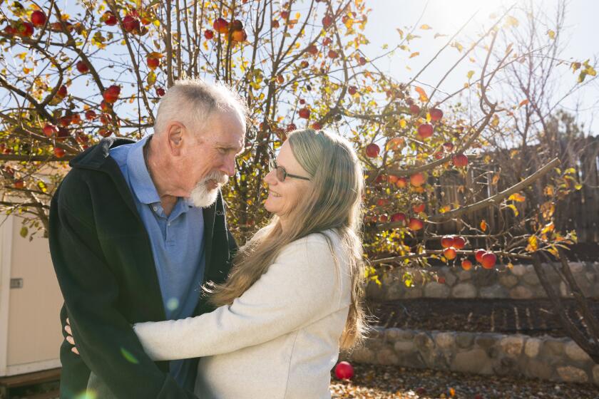 SPARKS, NEVADA, NOVEMBER 20, 2023 - Gary and Tammie Mund in their back yard in Sparks, Nevada on Monday November 20, 2023. Gary has Parkinson's Disease as a result of exposure to the herbicide Paraquat, and is part of a lawsuit against it's manufacturer and hopes to see it banned. (Monique Sady / For The Times)