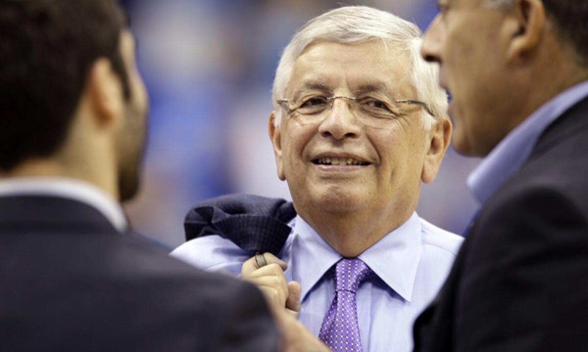 Flashback to NBA Commissioner David Stern trying on LeBron's suit