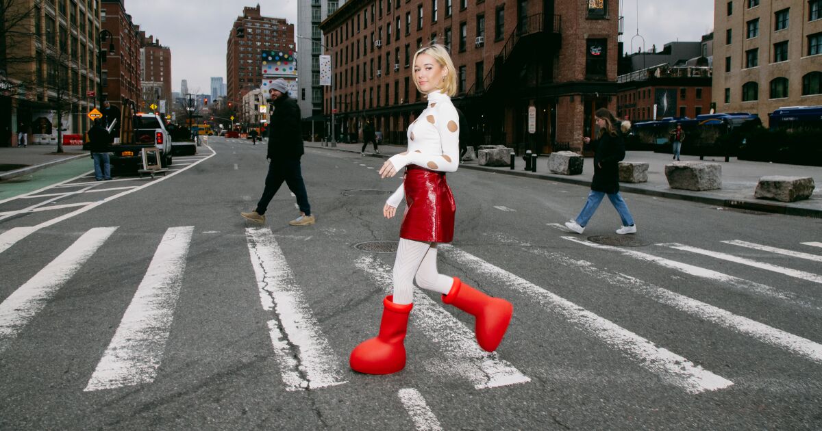 Chic or cartoonish? Here’s what to know about Hollywood’s love of those big red boots