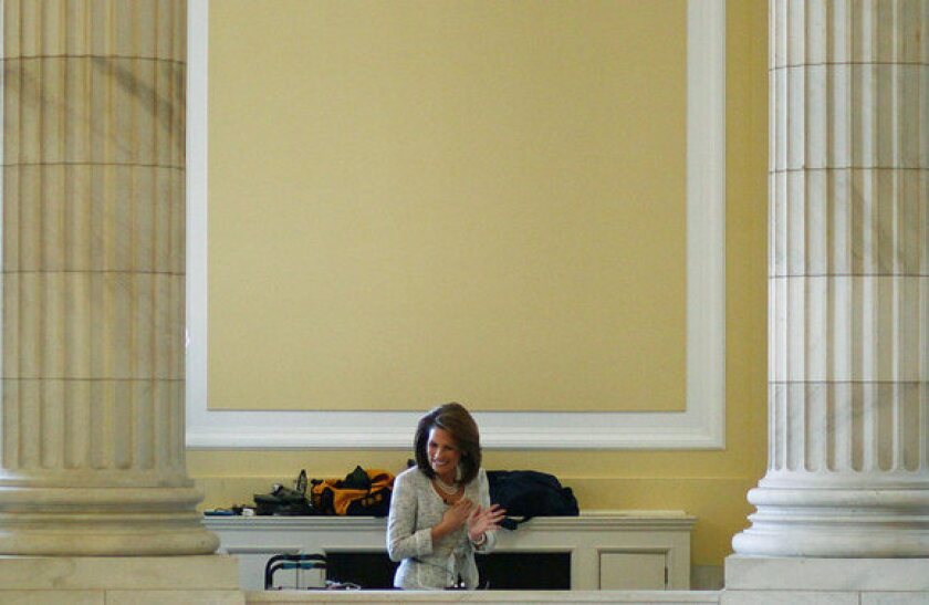 Republican Rep. Michele Bachmann of Minnesota in Washington on Friday preparing for a television interview.