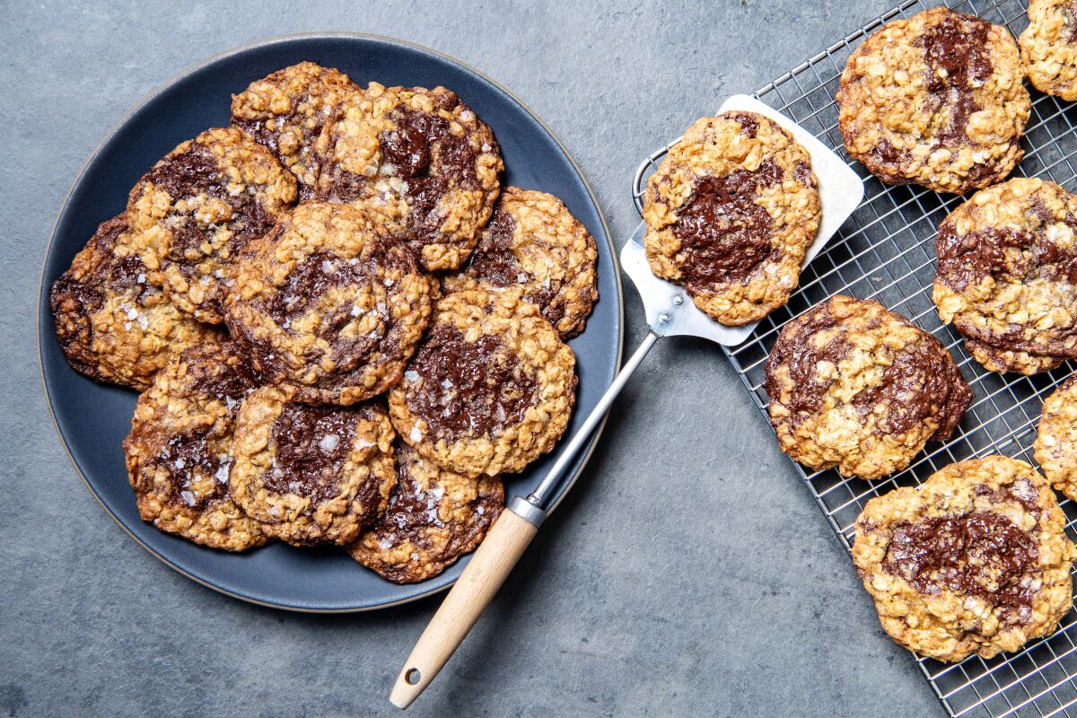 Thick And Chewy Chocolate Chunk Cookies on a plate