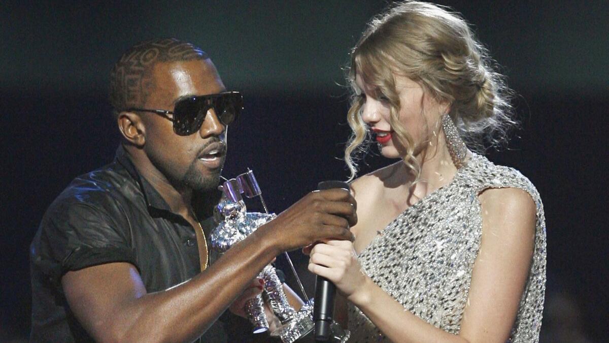 Kanye West, pictured here with Taylor Swift at the 2009 MTV Video Music Awards, recently found himself in hot water over comments he made about President Donald Trump on "SNL."