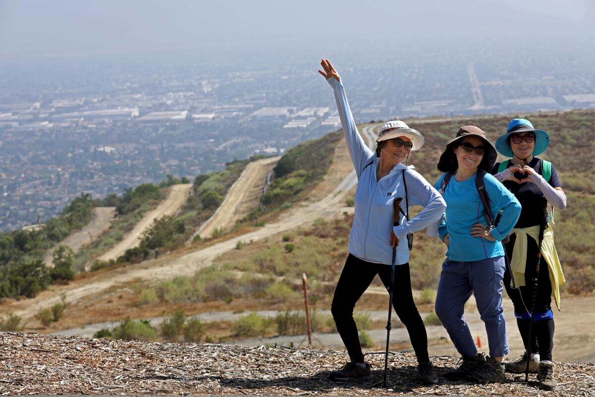  Hikers strike a pose for their friend