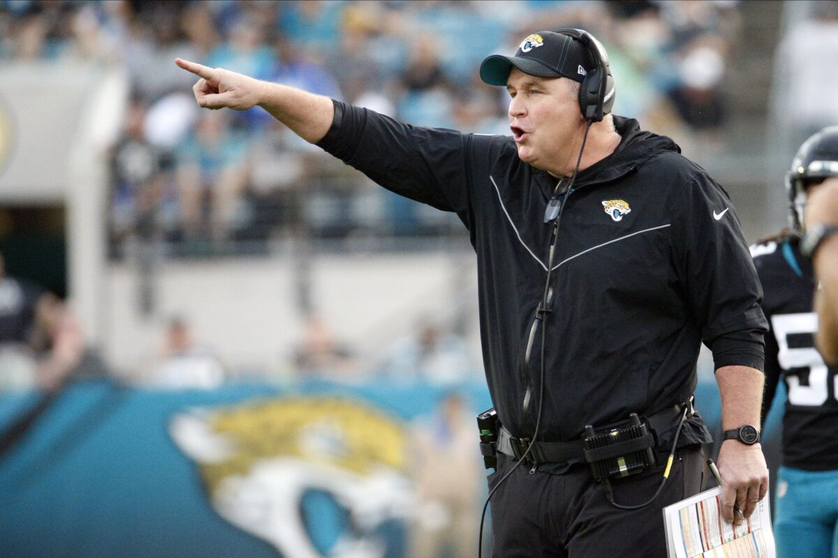 FILE - In this Sunday, Dec. 29, 2019 file photo, Jacksonville Jaguars head coach Doug Marrone directs his players against the Indianapolis Colts during the first half of an NFL football game in Jacksonville, Fla. The Jacksonville Jaguars have a chance to surprise, possibly even shock, much of the NFL. Just not themselves. After dumping three potential starters last week and assembling one of the youngest rosters in the league, the Jaguars are mostly a league-wide afterthought.(AP Photo/Stephen B. Morton)