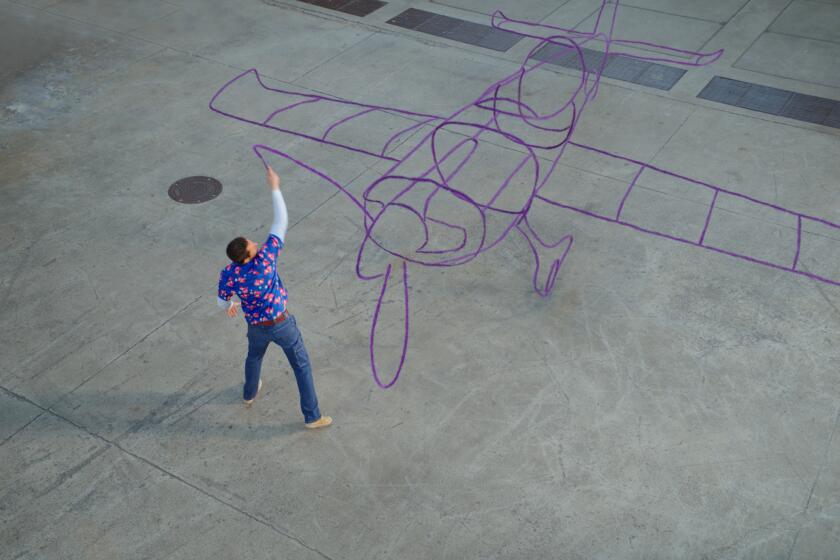 A man draws an airplane with a purple crayon in thin air.