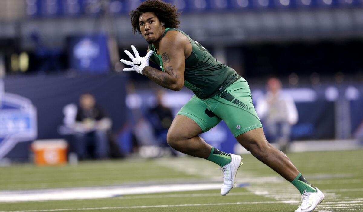 Former USC defensive lineman Leonard Williams runs a drill at the NFL Combine in Indianapolis on Sunday.