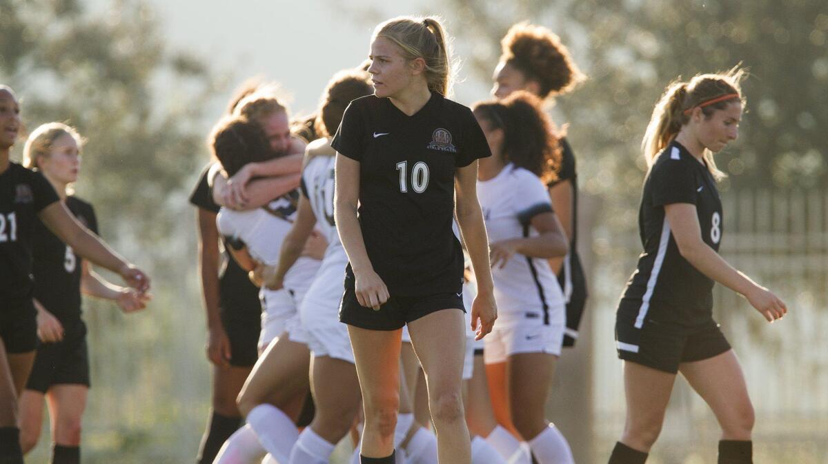 Huntington Beach High’s Summer Stewart (10) and teammates react after JSerra goes up 1-0 during the first half in the CIF Southern California Regional Division 1 championship game in San Juan Capistrano on Saturday.