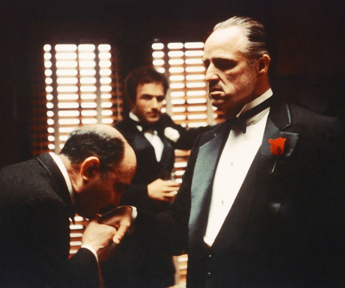Salvatore Corsitto, James Caan and Marlon Brando in the film "The Godfather."