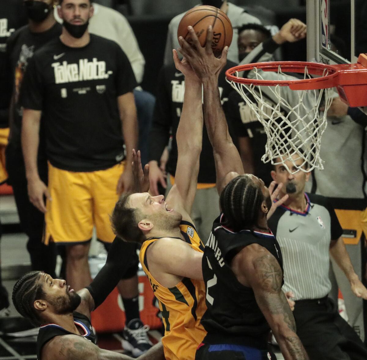 Clippers forward Kawhi Leonard #2 blocks the shot of Jazz forward Bojan Bogdanovic during Game 4.