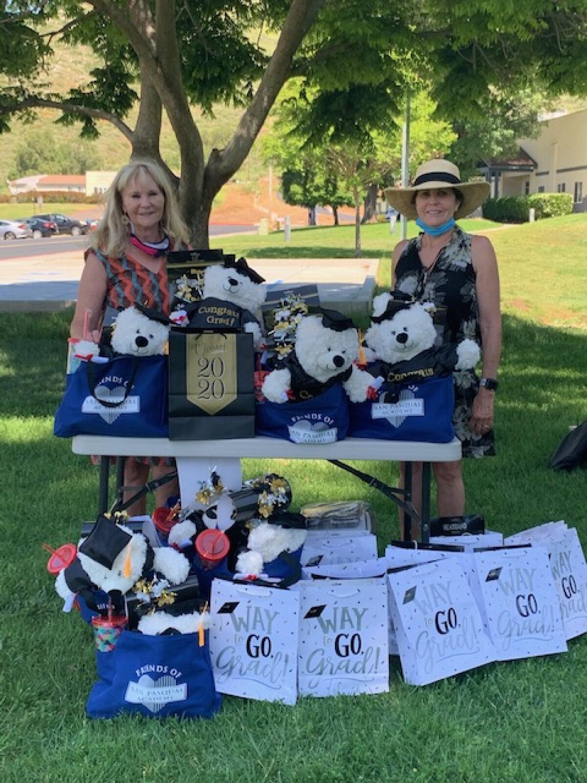 Friends of San Pasqual Academy board members Joan Scott and Kathy Lathrum handed out special graduation gifts for every senior at San Pasqual Academy. Each graduate is offered a scholarship to further their education. Friends of San Pasqual is currently supporting over 80 graduates, who are attending various colleges and vocational schools.